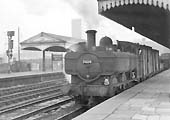 Ex-GWR 0-6-0PT 74xx class No 7424, one of the former GWR's many Pannier Tank locomotives, is seen passing through Platform 5
