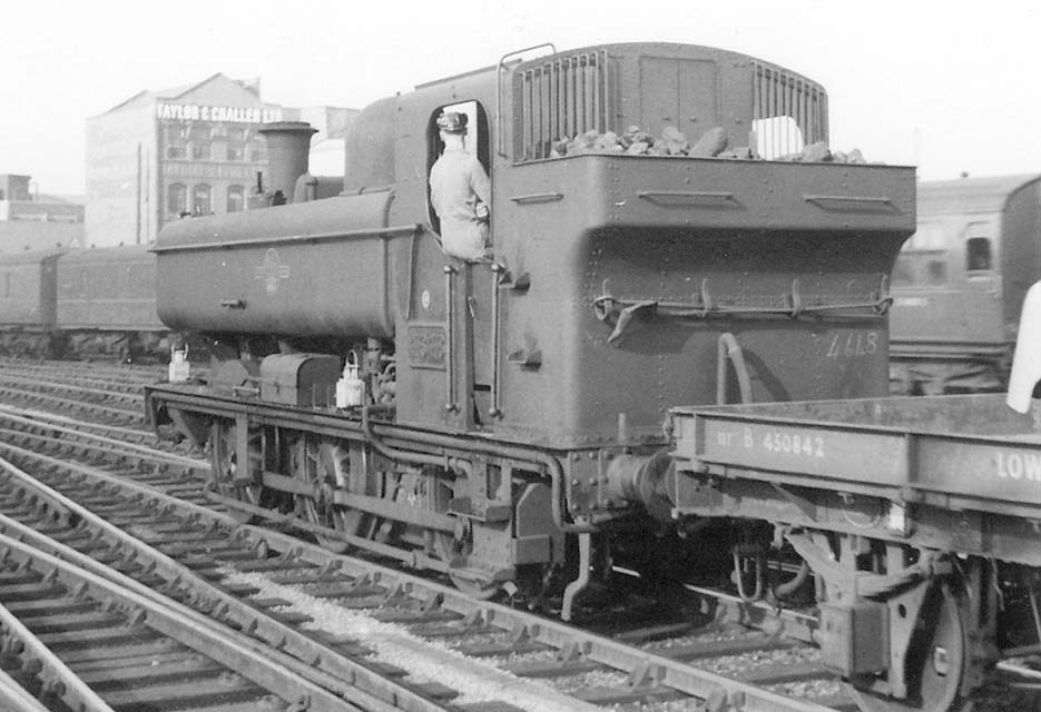 Ex-GWR 0-6-0PT 57xx class No 4648 is seen on the down middle road at the head of a short trip service from Bordesley to Hockley goods yard on 23rd October 1963