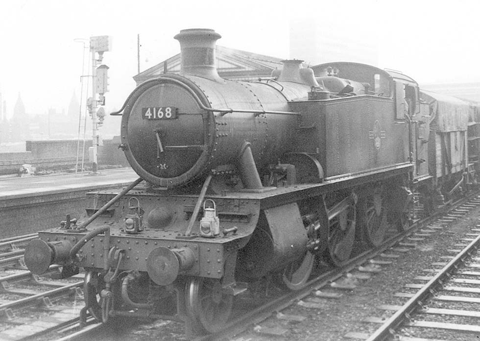 British Railways built 2-6-2T Large Prairie No 4168 is seen passing through on the down through road whilst at the head of a Class E short freight express working
