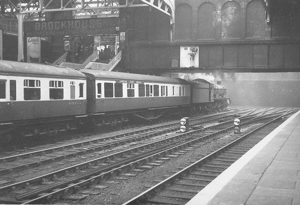 Ex-GWR 4-6-0 Hall class No 5954 'Faendre Hall' is seen standing at the South end of Platform 7 ready to depart with the up Cambrian Express to London