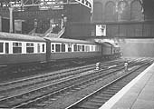 Ex-GWR 4-6-0 Hall class No 5954 'Faendre Hall' is seen standing at Platform 7 ready to depart with the up Cambrian Express to London