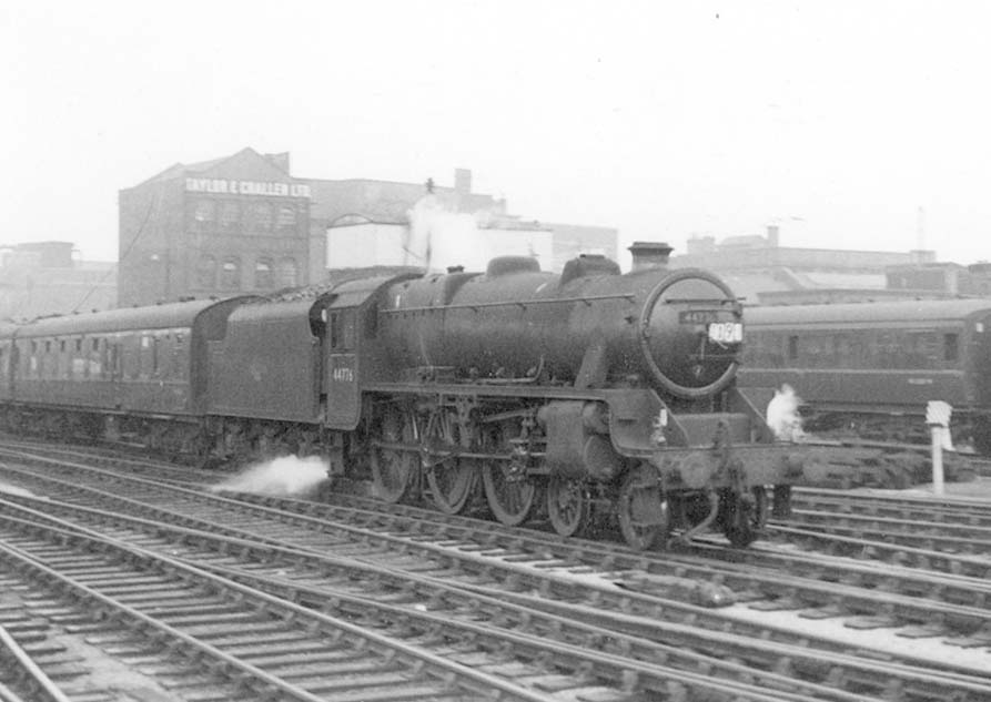 Ex-LMS 4-6-0 Class 5 No 44776 is seen entering Snow Hill station on the up through road whilst at the head of a football special express working to Wembley
