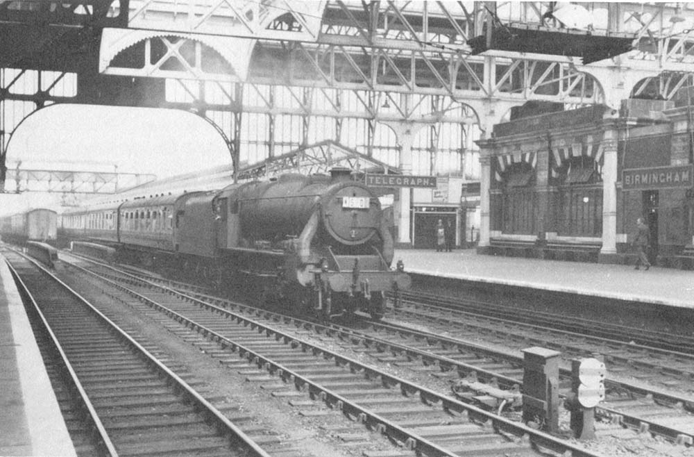 British Railways built 4-6-0 5MT No 44750, fitted with Caprotti valve gear and Timken roller bearings, is seen passing through Snow Hill on an up Class A express