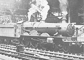 Ex-GWR 4-6-0 Star class No 4013 'Knight of St Patrick' is seen standing at Platform 7 whilst at the head of a Class B up local passenger service