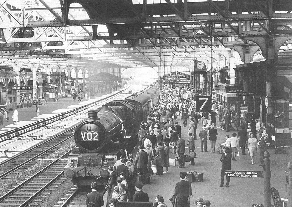 Ex-GWR 4-6-0 King class No 6002 'King William IV' is seen standing at Platform 7 at the head of the 6 30am express service from Birkenhead to Paddington