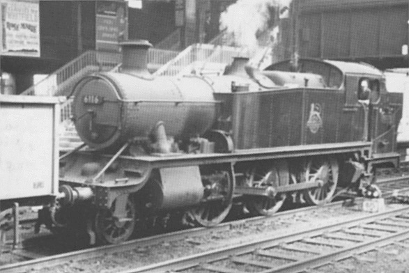 Ex-GWR 2-6-2T 61xx class No 6116 is seen running bunker first alongside Platform 7 waits at signals whilst on an up empty mineral train on 11th May 1961