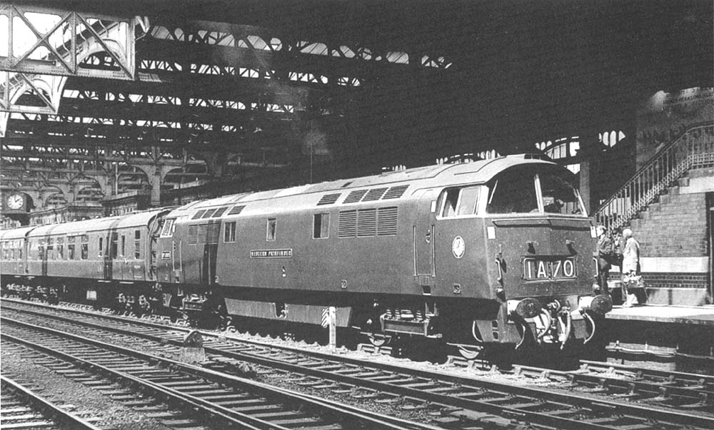 British Railways C0-Co Western class D1001 'Western Pathfinder' is seen standing at Platform 7 on an up express service to Paddington in late 1962