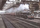 Ex-GWR 4-6-0 King class No 6002 'King William IV' is seen arriving at Platform 7 whilst at the head of the 7 20am Pwllheli to Paddington service on 12th August 1961