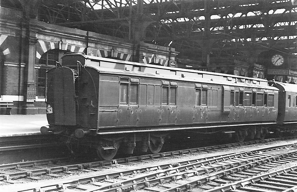 A 56ft long ganged Brake Third clerestory coach (diagram D29) believed to be No.3446 waits at the rear of an Up train in platform 7 at Snow Hill Station in 1947
