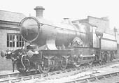 GWR 33xx (Bulldog) class 4-4-0 No. 3353 'Pershore Plum' in the New Sidings adjacent to the turntable in 1932