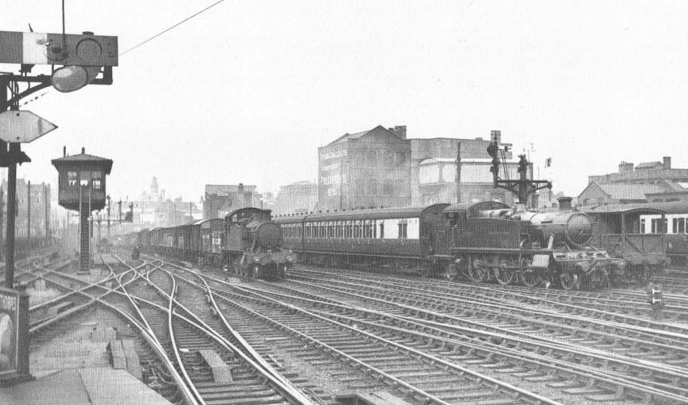 A pair of Prairies passing Birmingham North Signal Box as they approach the north end of Birmingham Snow Hill station on Friday 7th September 1934