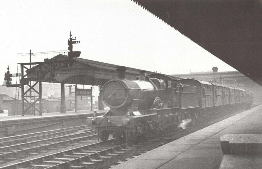 Great Western Railway 33xx (Bulldog) class 4-4-0 No 3380 'River Yealm' steaming through Snow Hill on the down through main line