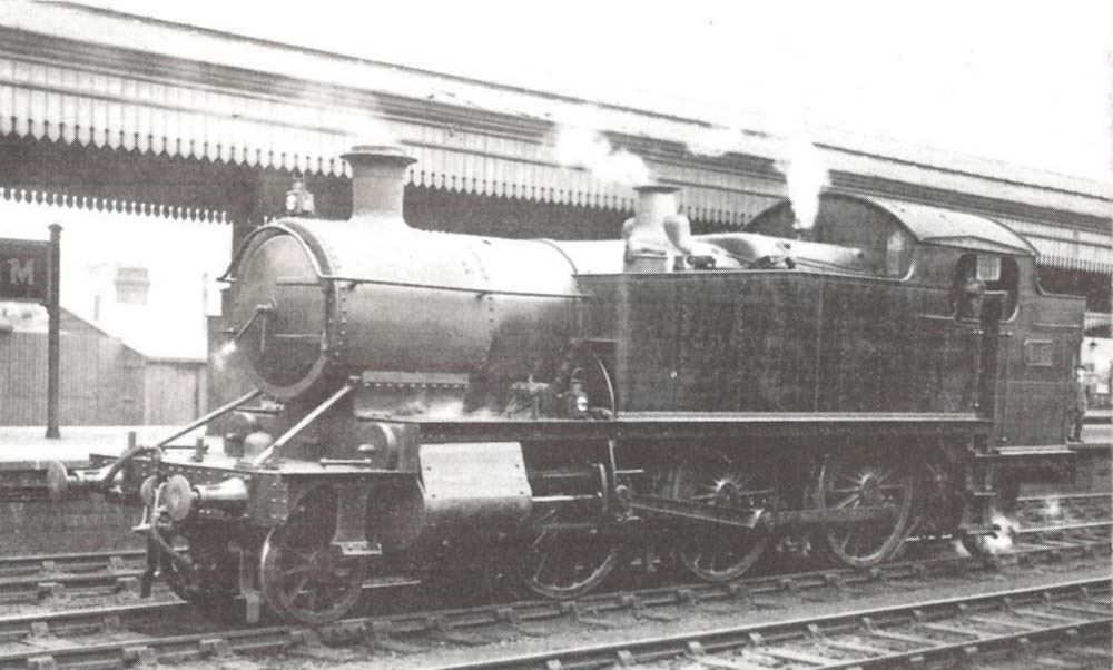 Great Western Railway 51xx class 2-6-2T No 5138 travelling light bunker first on the up through main line in the early 1930s