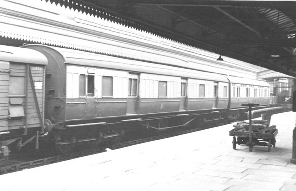 GWR 70ft Ocean Mail (Post Office Stowage) Van No 1202 waits in Snow Hill bay platform No 10 in 1947