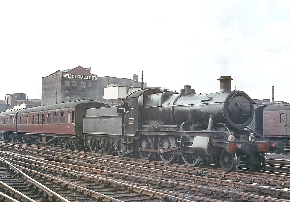 Ex-GWR 43xx class 2-6-0 No 6364 brings empty coaching stock into Snow Hill station on 28th April 1964