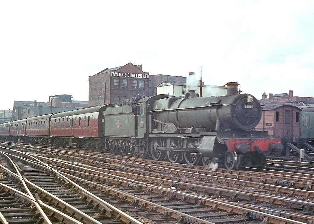 Ex-GWR 68xx Grange Class 4-6-0 No 6861 'Crynant Grange' enters Snow Hill on an up express on 28th April 1964