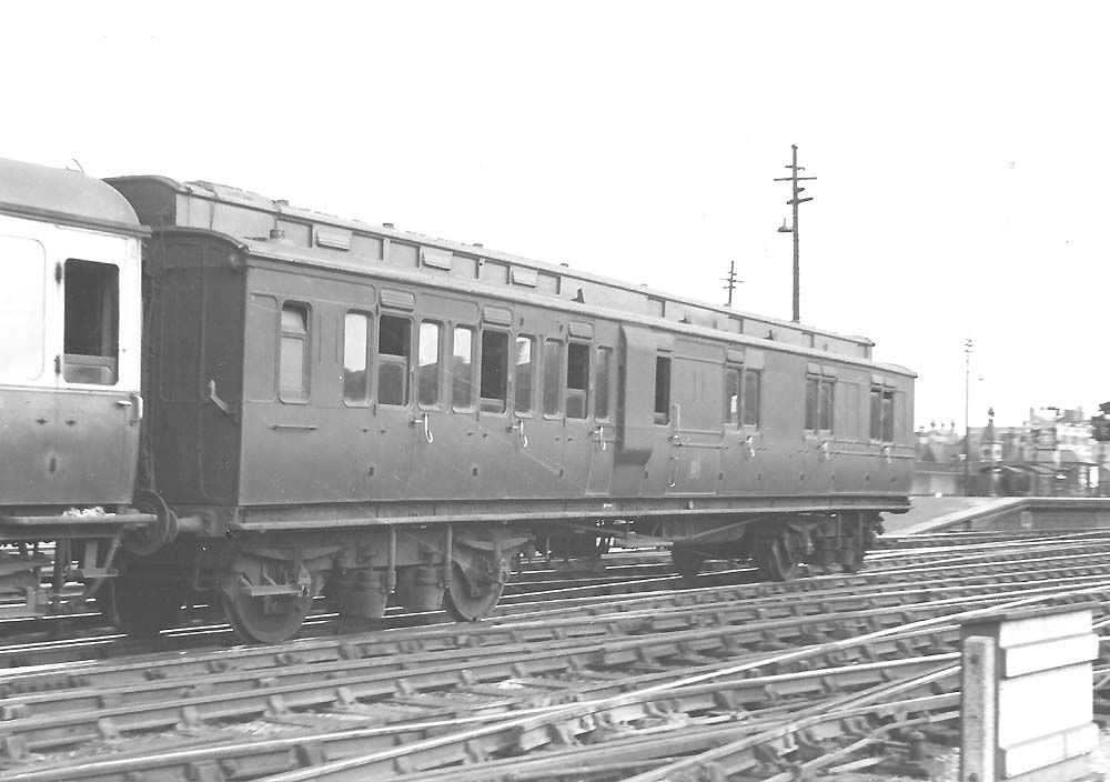 GWR ganged corridor clerestory brake third No 3358 at the end of a down train on the main line at the north end of Birmingham Snow Hill station in 1947