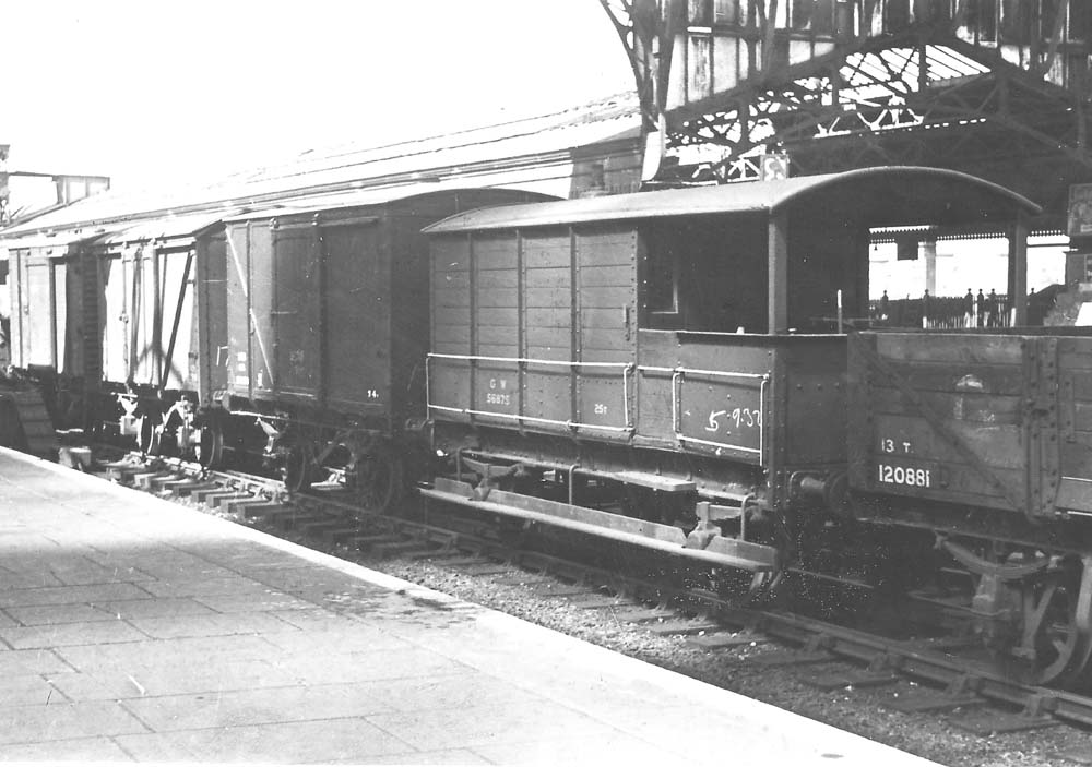 GWR 25ton Goods Brake Van No 56875 in a mixed freight train on the main down line passing through Birmingham Snow Hill Station in 1947