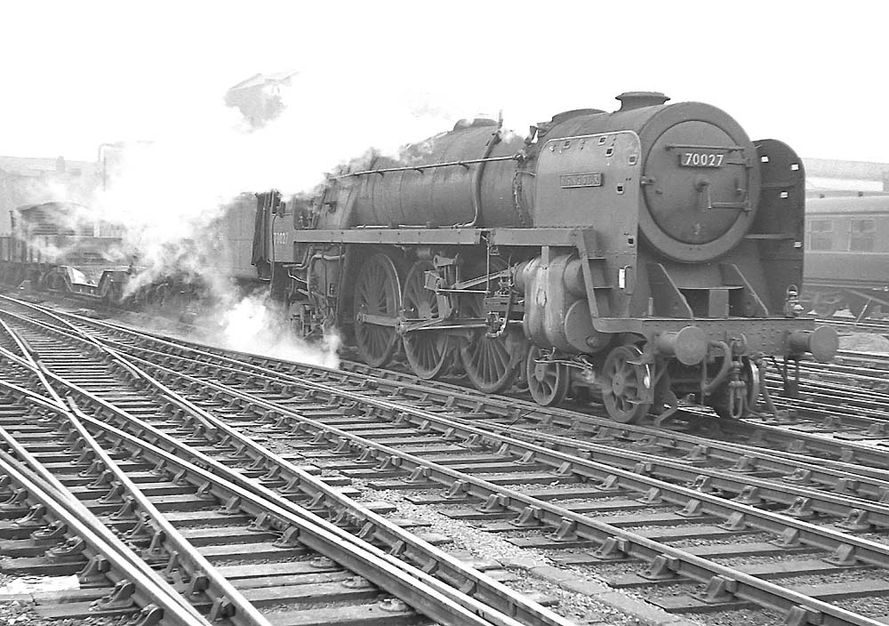 British Railways Standard Class 7MT 4-6-2 No 'Rising Star' passes through Snow Hill station on an up freight service on 22nd February 1964