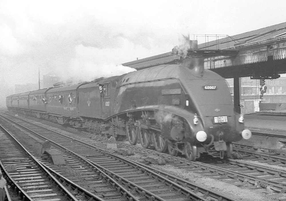 Ex-LNER 4-6-2 A4 60007 'Sir Nigel Gresley' passes through Snow Hill station on up special on 23rd October 1965