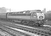 Brush Type 4 D1695 passes through Birmingham Snow Hill station on an up express on 15th February 1964