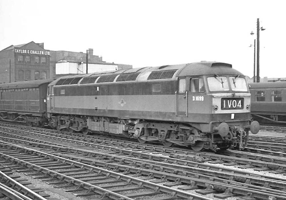Brush Type 4 D1699 passes through Birmingham Snow Hill station on an up service on 13th March 1964