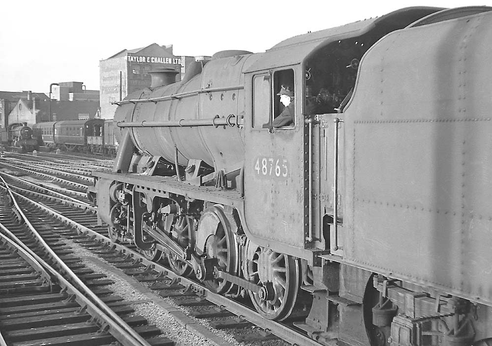 Ex-LMS 2-8-0 Class 8F No 48765 passes through Birmingham Snow Hill station on 23rd November 1963