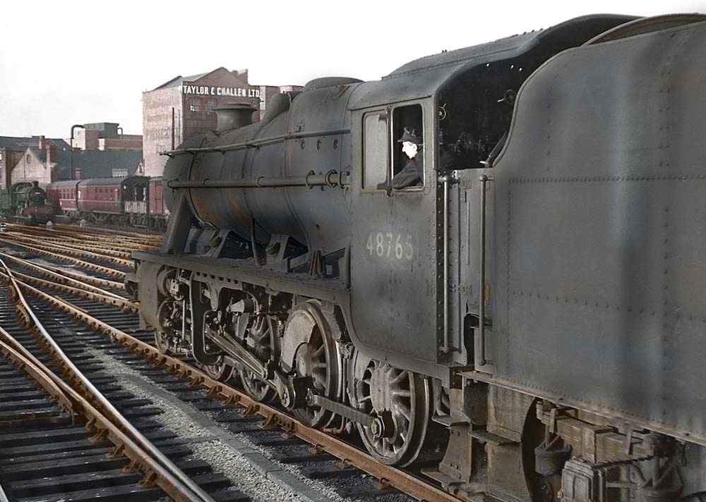 Ex-LMS 2-8-0 Class 8F No 48765 passes through Birmingham Snow Hill station on 23rd November 1963