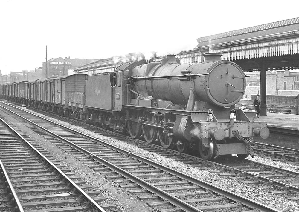 Ex-GWR 4-6-0 County class No 1014 'County of Glamorgan' passes through Snow Hill station with an up Type 3 freight service on 19th July 1963