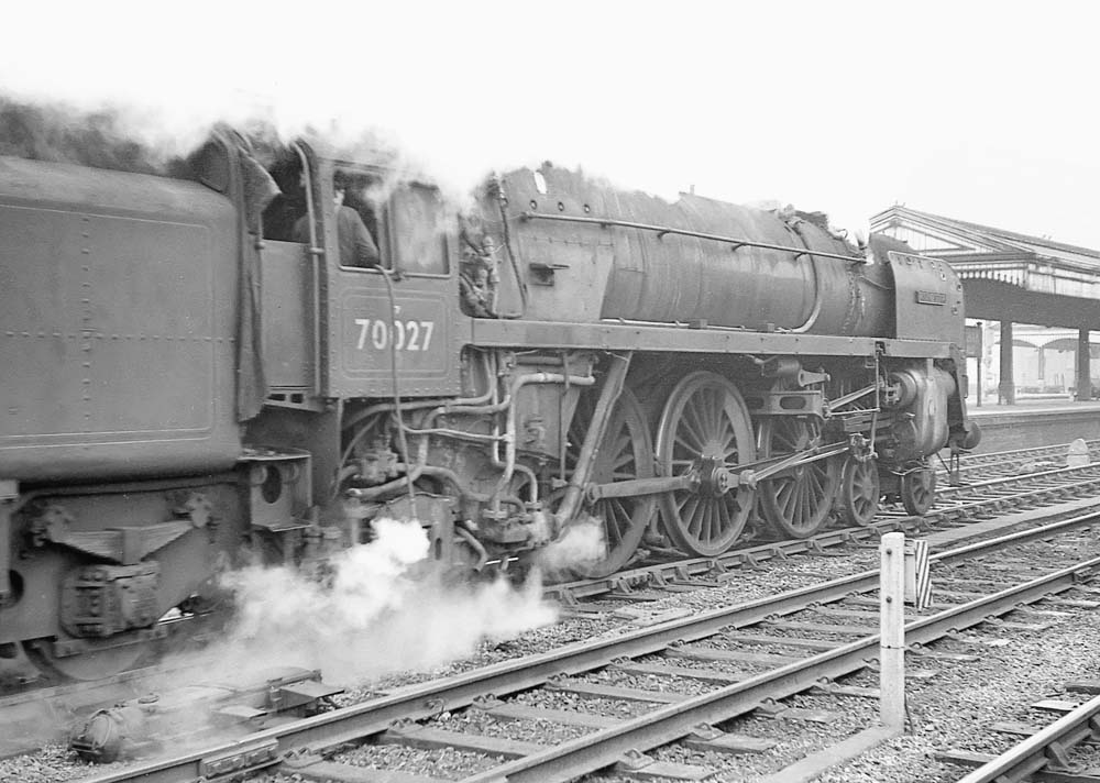 British Railways 4-6-2 7MT No 70027 'Rising Star' passes through Snow Hill station on 22nd February 1964