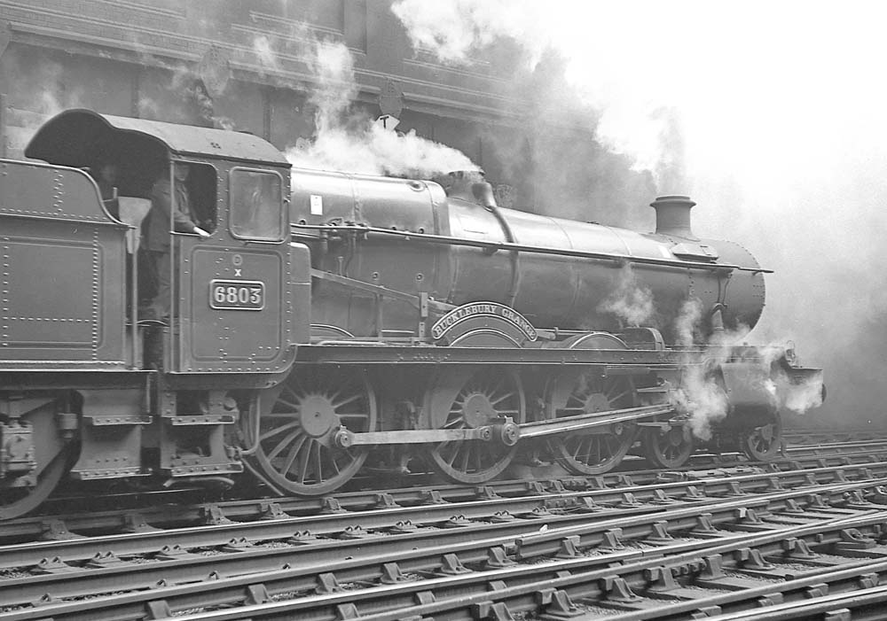 Ex-GWR 4-6-0 68xx class No 6803 'Buclebury Grange' stands at Snow Hill station on 7th March 1964