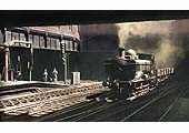A colourisation of ex-GWR 0-6-0PT No 8737 emerging out of the black depths of Snow Hill Tunnel