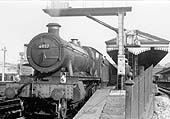 Ex-GWR 4-6-0 Hall class No 6937 'Conyngham Hall' is seen standing at Platform 5 whilst at the head of a down Class A express service on 8th August 1964