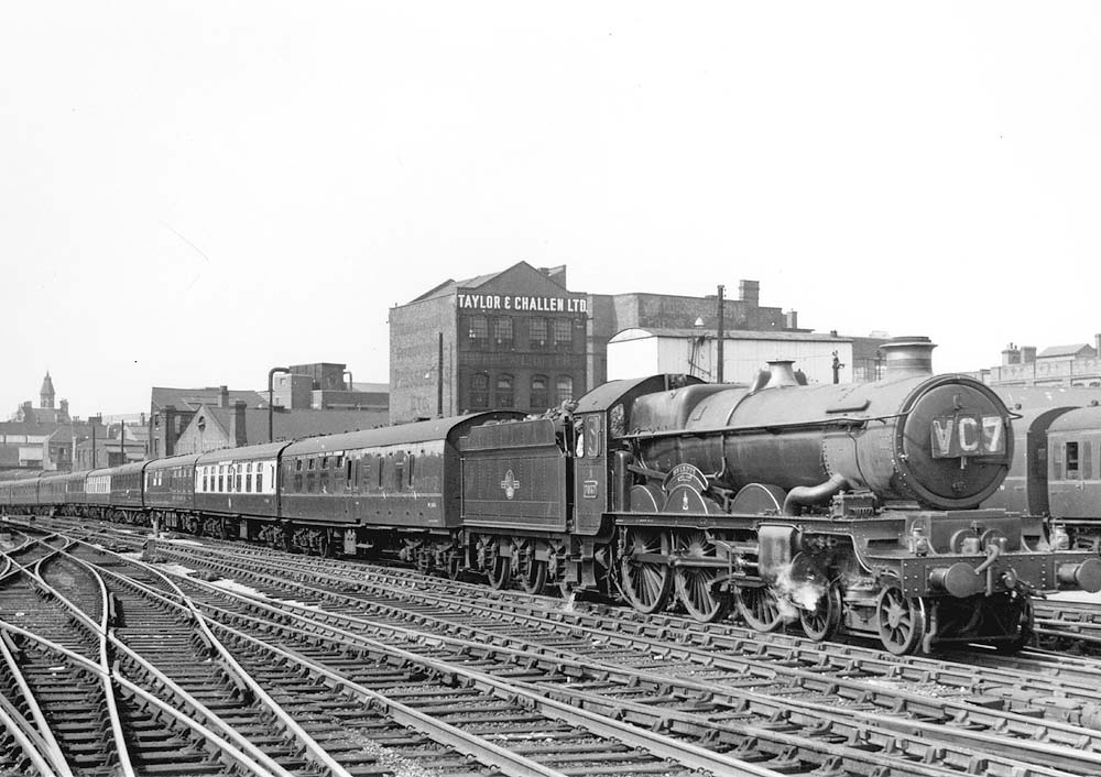British Railways built Castle class No 7037 'Swindon', the last member of the class to be built, is seen entering Platform 7 at the head of an up Class A express service