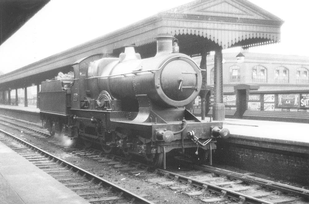 GWR 4-4-0 City class No 3717 'City of Truro' is seen standing in Snow Hill station's Platform 3 bay waiting to pilot an express train forward to the north