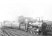 GWR 4-6-0 Hall class No 4936 'Kinlet Hall' is seen on an up express service to Paddington as it enters Snow Hill station circa 1929