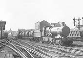 GWR Bulldog 33xx class 4-4-0 No 3442 �Bullfinch� is seen on an up train of four 3,000 gallon six-wheeled milk tank wagons and a passenger brake