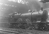 GWR 4-4-2 No 104 Alliance, a French designed locomotive, is seen in original condition standing at Platform 7 on an up express service to Paddington