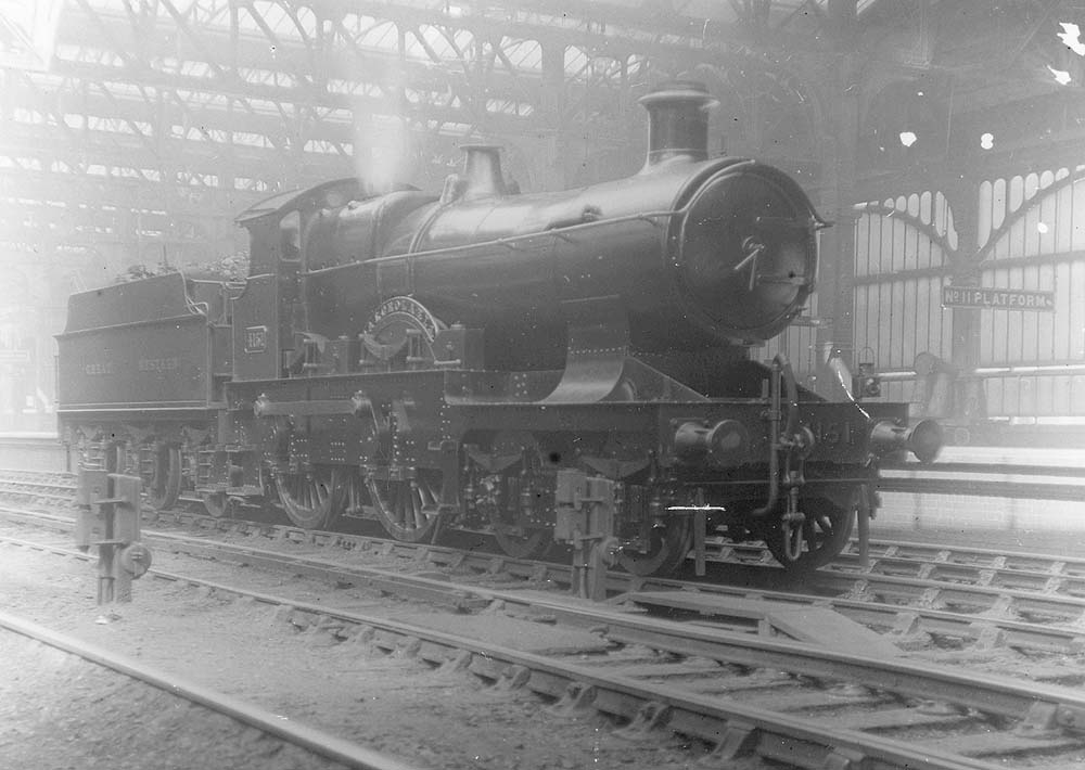 GWR 4-4-0 Flower class No 4151 'Calceolaria' is seen standing light engine on the up through road at Snow Hill station in April 1921