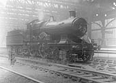 GWR 4-4-0 Flower class No 4151 'Calceolaria' is seen standing light engine on the up through road at Snow Hill station in April 1921