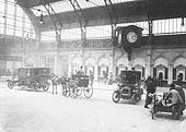 View of the Concourse shortly after its opening in 1912 with a range of horse-drawn to motorised road vehicles standing on the internal driveway