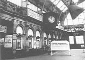 View of the Concourse ticket offices and the notice informing passengers that trains to London would cease in March 1967