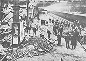 Looking along Platform 5 from the steps to the over bridge in the direction of Wolverhampton showing the major clear up operation