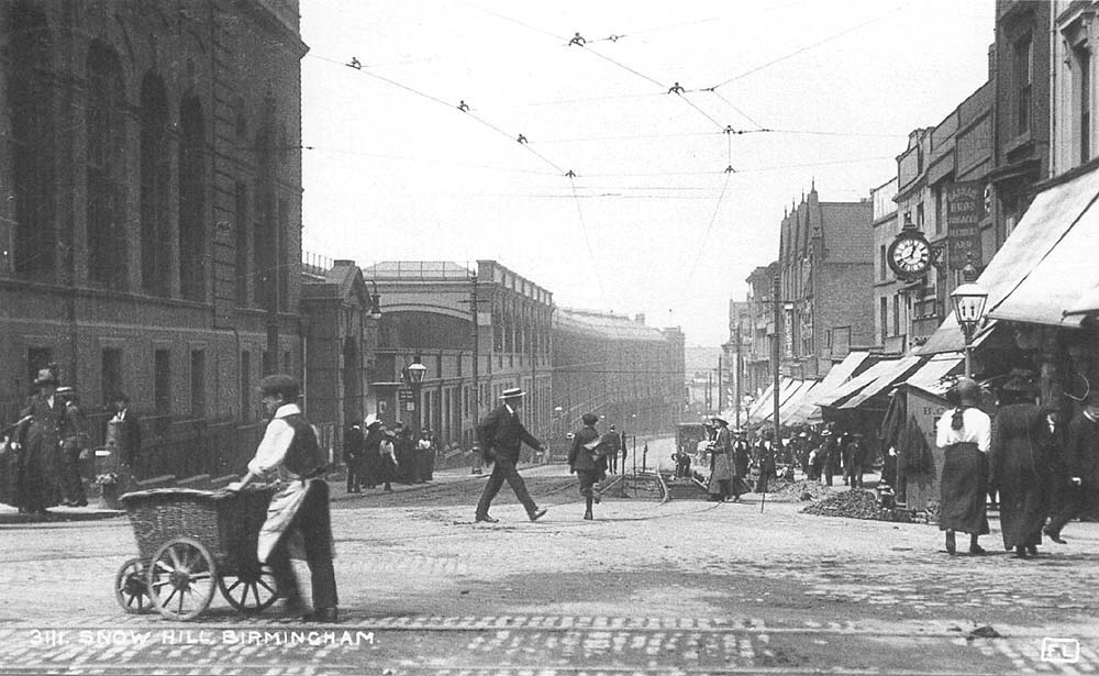 Looking down Snow Hill towards Great Charles Street in the distance with the station on the left hand side