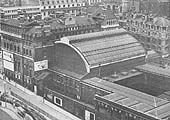 An elevated rear view of the former hotel and the station concourse together with the flat roof and roof lights of the booking offices