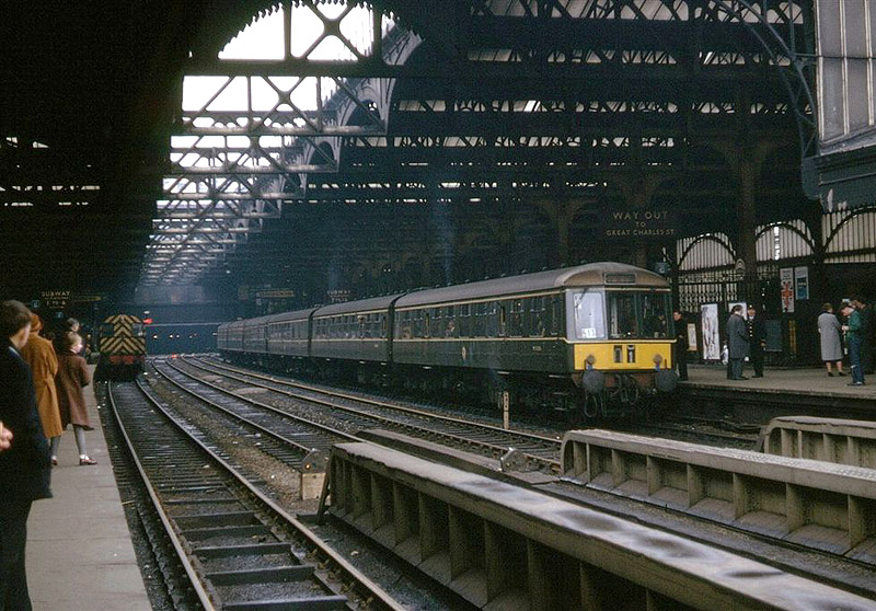 A set of six DMUs are seen standing at Platform 6 and a diesel shunter is standing at Platform 7 on the last day of 'Inter City' services