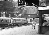 British Railways Type 4 Warship class D827 'Kelly' waits at Platform 7 with the 7 30am Shrewsbury to Paddington service due to arrive at 11 am in London