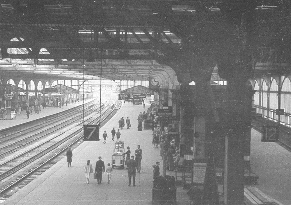 View of Platform 7 from the steps showing on the right hand side the glazed side walls which fronted on to the Snow Hill side of station