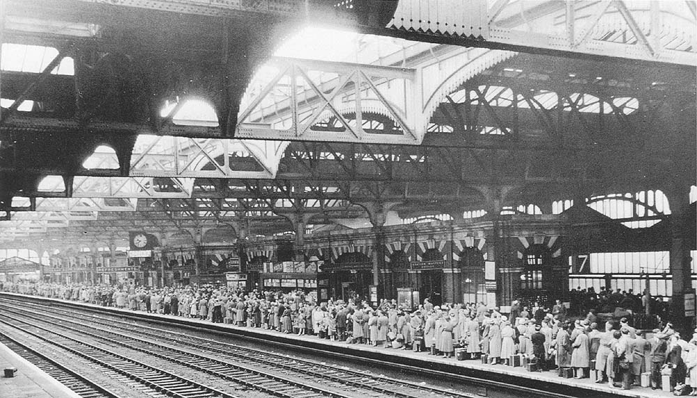 View of Platform 7 which is inundated with holiday makers waiting for the 'Cornishman' on the first day of Birmingham's holiday fortnight