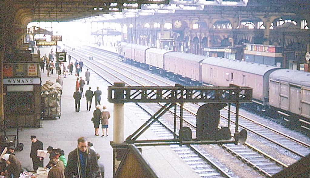 A diesel shunter acts a station pilot and marshals parcel vans in Platform 7 on the last day of services to Paddington on 5th March 1967